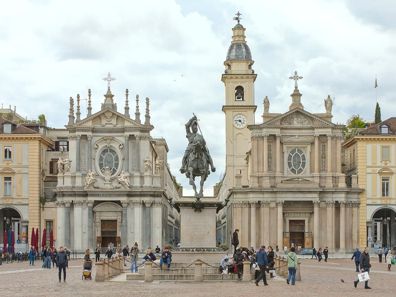 The twin baroque church facades of Piazza San Carlo with the equestrian statue of Emanuele Filiberto standing between them